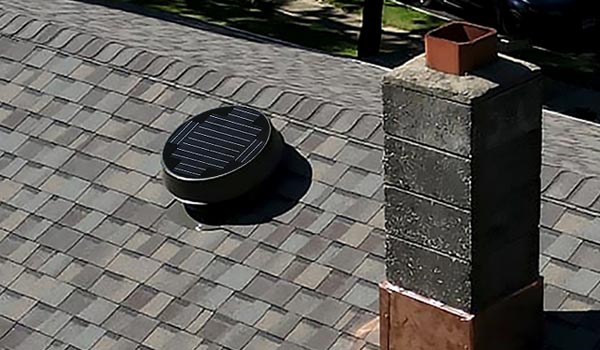 Natural Light Low Profile Solar Attic Fan shot from drone mobile