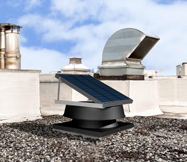 Natural Light curb mount fan on gravel roof thumb